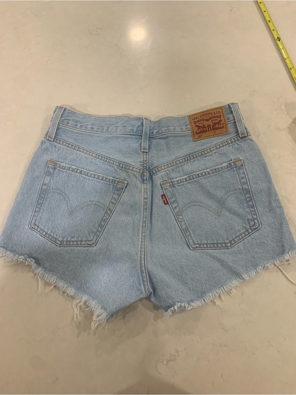Levi's Light Blue Distressed Denim Cutoff Shorts - Picture 4 of 10